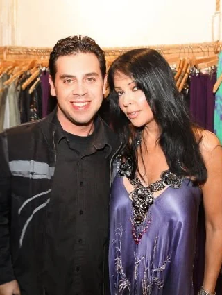 Jeff Linett with a guest wearing purple