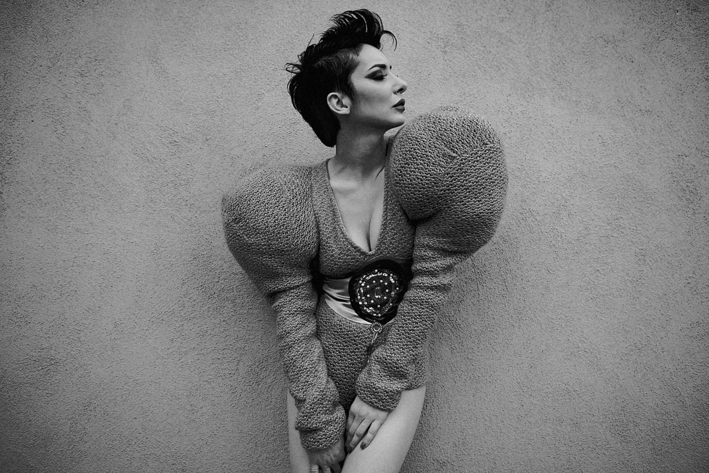 Black-and-white fashion portrait with geometric knitwear