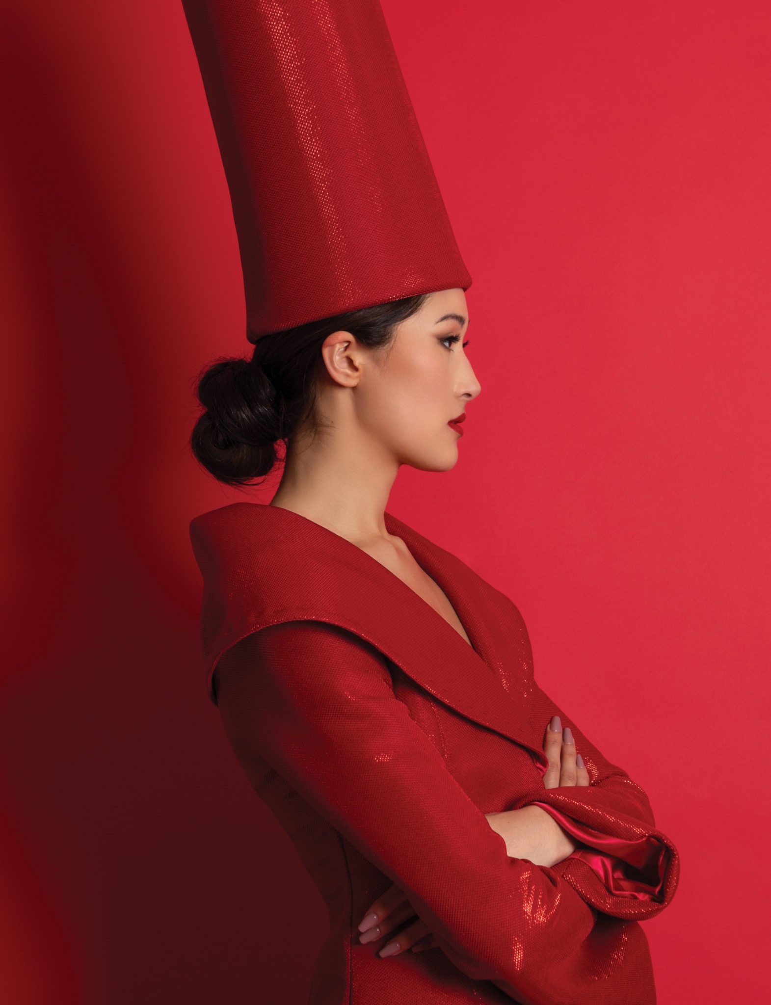 Red fashion portrait facing right by Jeff Linett