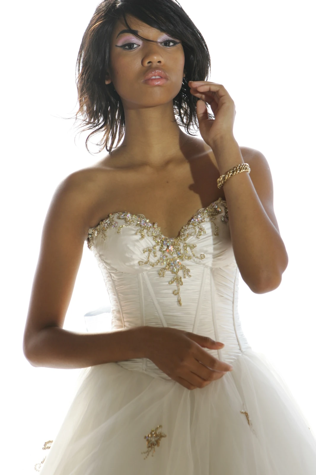 Bride in a white gown against a bright background by Jeff Linett