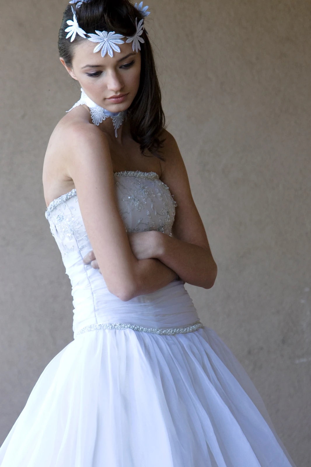 Bridal portrait with floral hair accessories by Jeff Linett